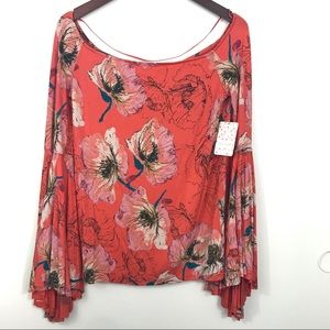 Free People trendy orange floral bell sleeve top